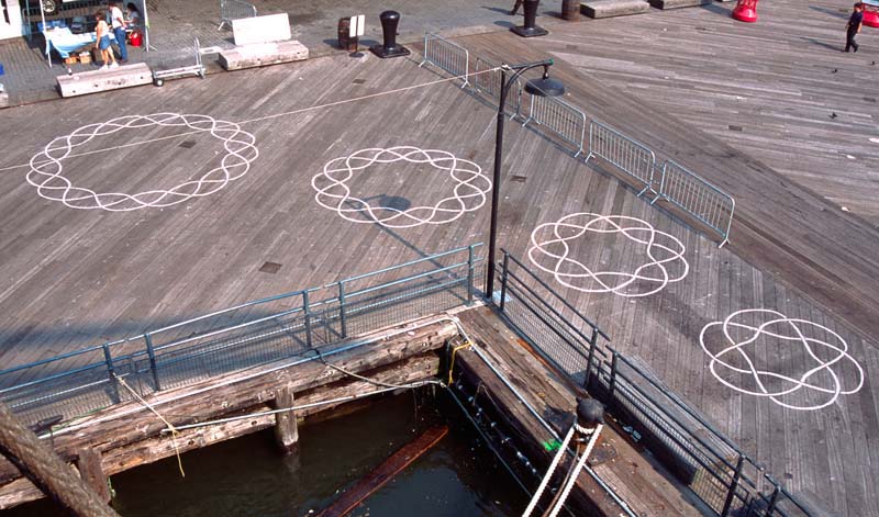 Four trefoil knots - chalk drawings